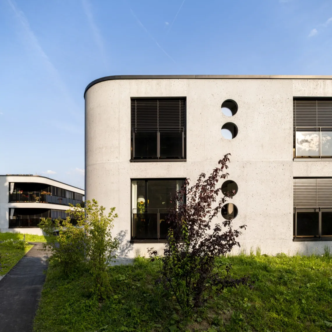 Wohnüberbauung mit Sichtbetonfassade
